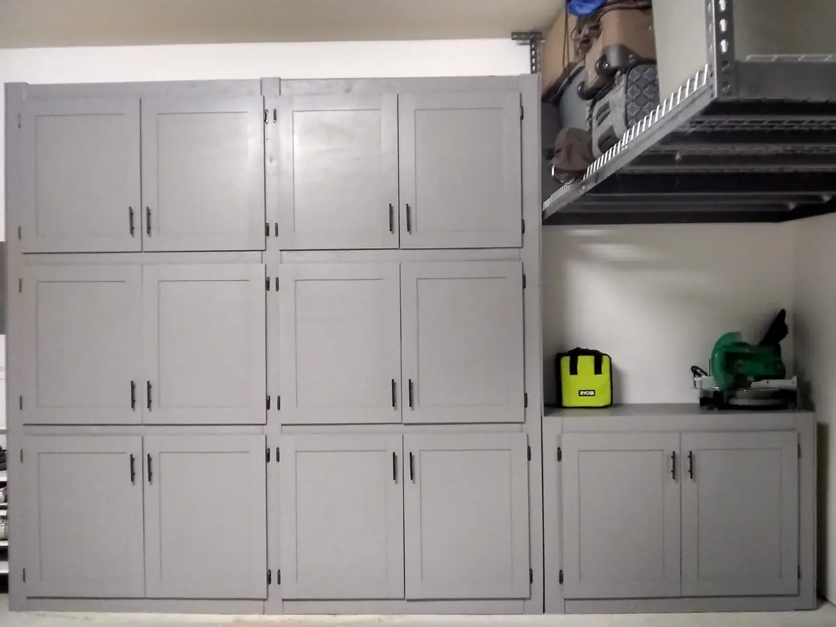 https://theselfsufficientliving.com/wp-content/uploads/2019/10/Garage-Shelves-With-Doors-1.jpg.webp